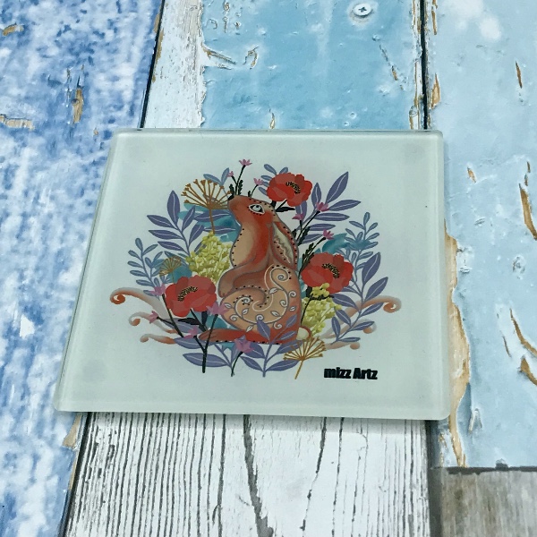 Hare Amongst The Blooms - A hare illustrations with flowers on a toughened glass coaster